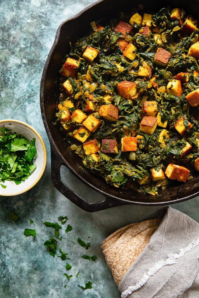 Cast iron pan with saag panner