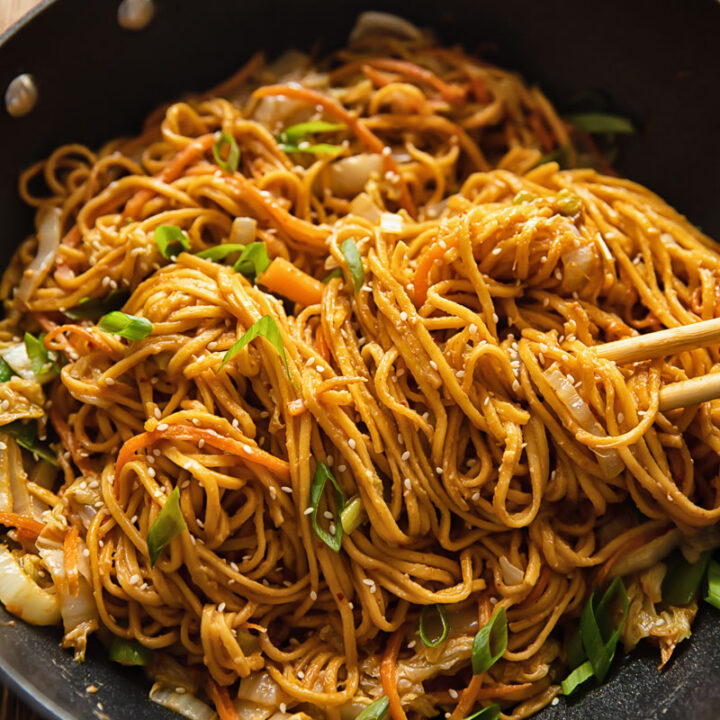 wok full of spicy peanut noodles