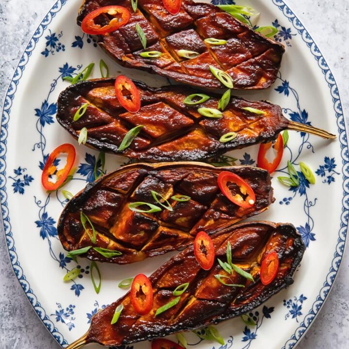 top down of a plate of four miso glazed aubergine
